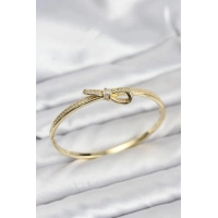 Pirinç Gold Renk Zirkon Taşlı Fiyonk Model Kadın Kelepçe Bileklik