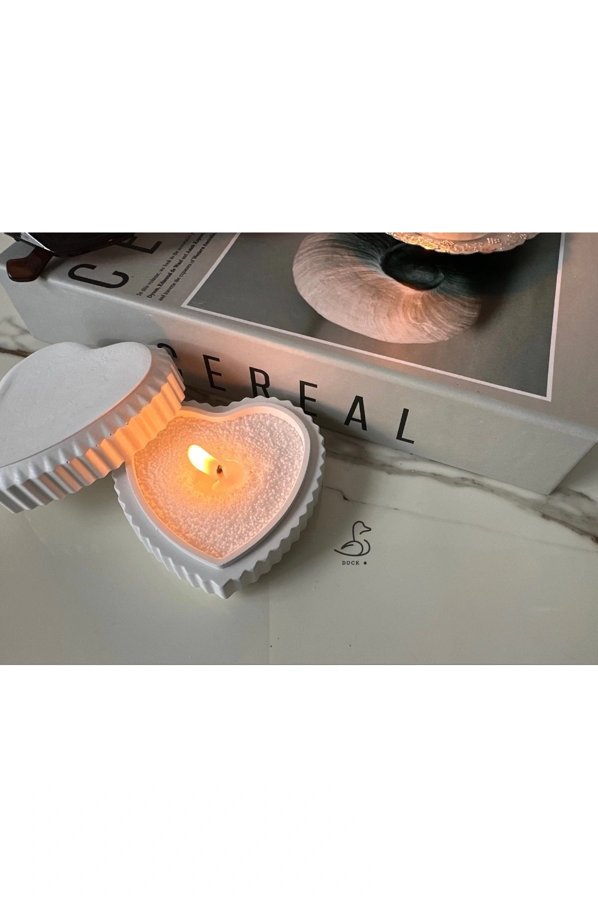 Kalp görünümlü inci tozlu mumluk