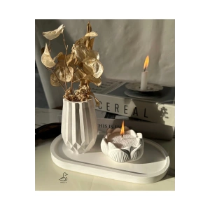 Geometrik desenli vazo ve lotus çiçek inci tozlu mumluk