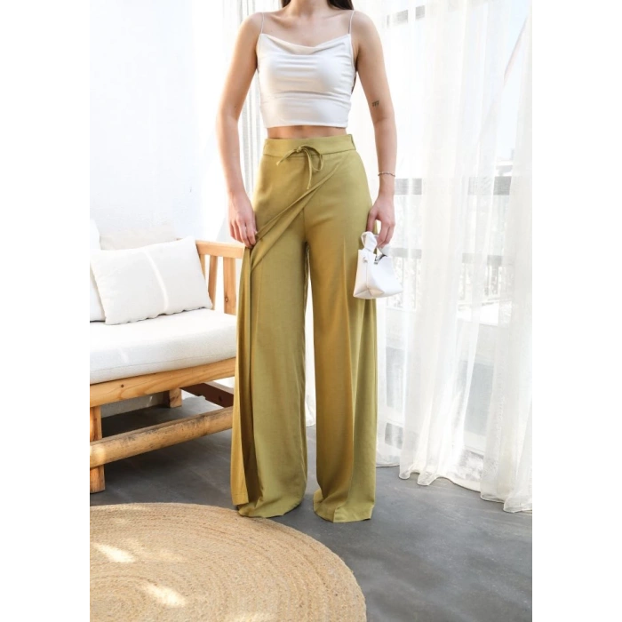 Keten Önü Çapraz Parçali Lasti̇kli̇ Ve Bağcikli Geni̇ş Paça Pantolon