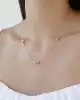Dorika Detaylı Altın Top Kolye