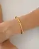 22 Ayar Taşlı Mini Kareli Kelepçe Bileklik