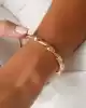 Kıvrımlı Altın Kelepçe Bileklik