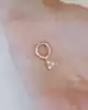 Üç Taş Sallantılı Altın Küpe