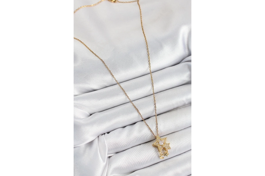 Shoecide 316l Çelik Zirkon Taşlı Sallantılı Yıldız Model Gold Renk Kadın Kolye