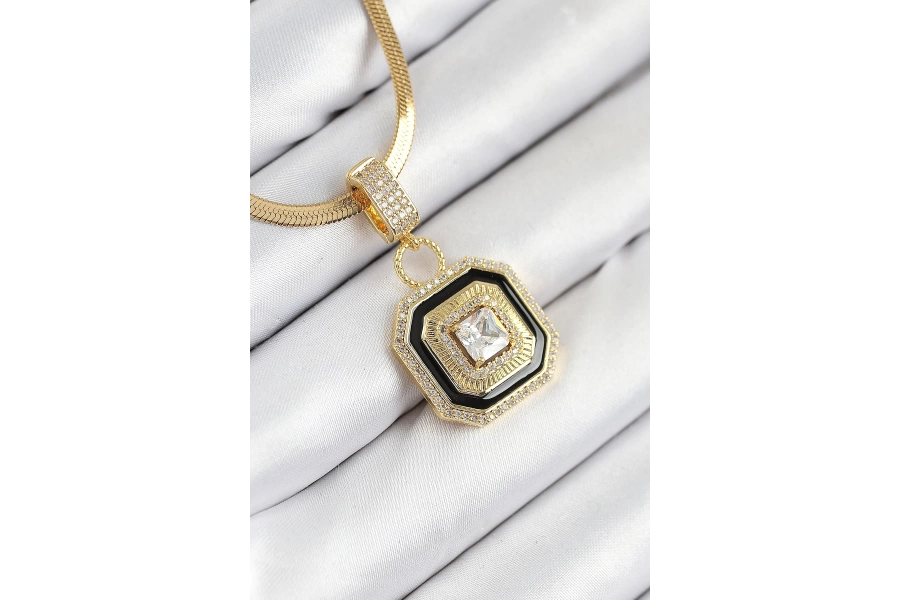 Shoecide 316l Çelik Zirkon Taşlı Siyah Detaylı Baget Model Gold Renk Kadın Kolye