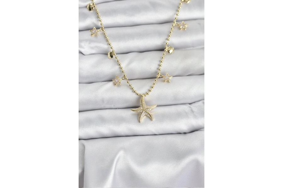 Shoecide Pirinç Gold Renk Zirkon Taşlı Deniz Yıldızı Model Kadın Kolye