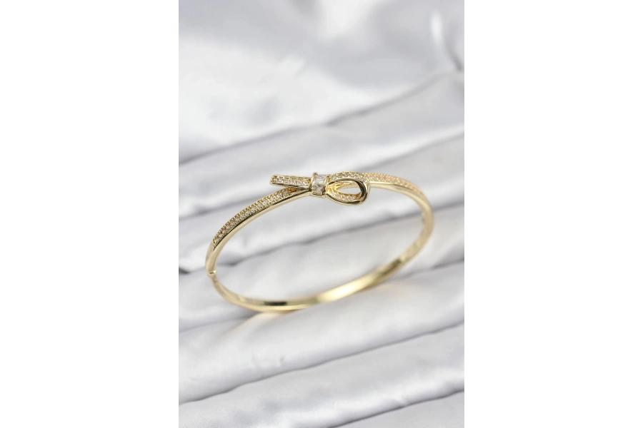 Shoecide Pirinç Gold Renk Zirkon Taşlı Fiyonk Model Kadın Kelepçe Bileklik