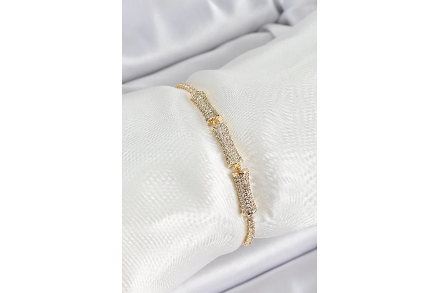 Shoecide Pirinç Gold Renk Zirkon Taşlı Kemik Model Kadın Bileklik