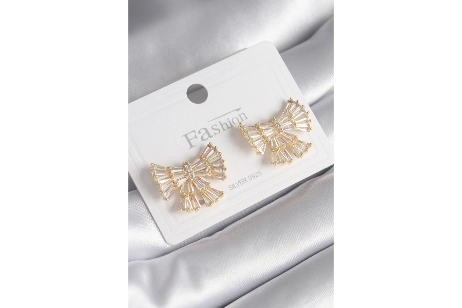 Shoecide Pirinç Gold Renk Zirkon Taşlı Kurdele Model Kadın Küpe