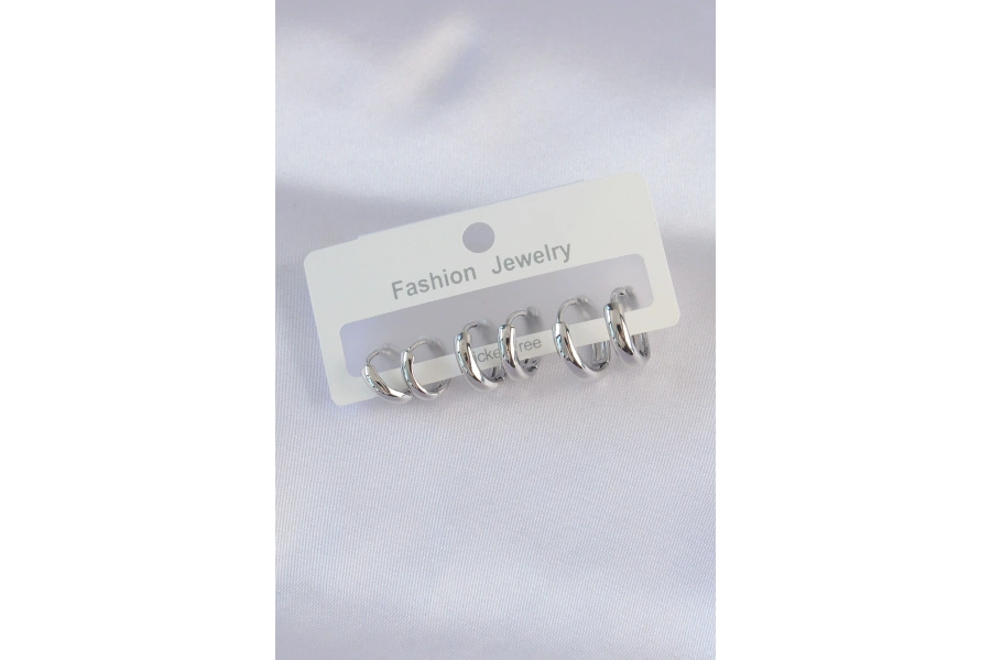 Shoecide Pirinç Gümüş Renk Oval Bombeli Küpe Seti