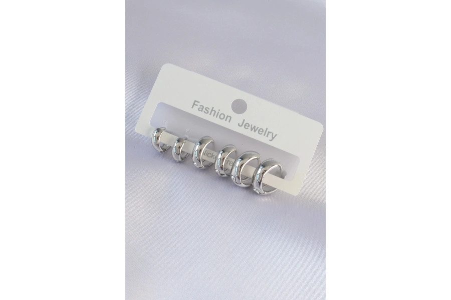 Shoecide Pirinç Gümüş Renk Oval Bombeli Küpe Seti