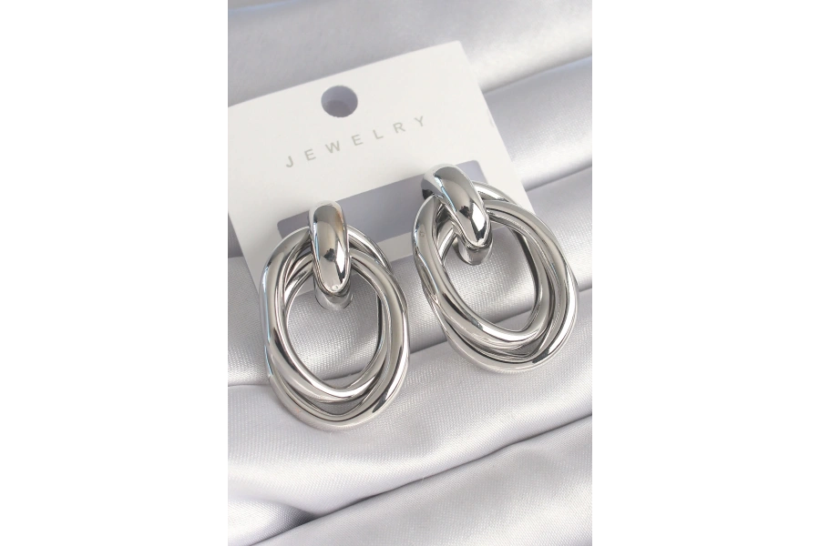 Shoecide Pirinç Gümüş Renk Oval Sarmal Model Kadın Küpe