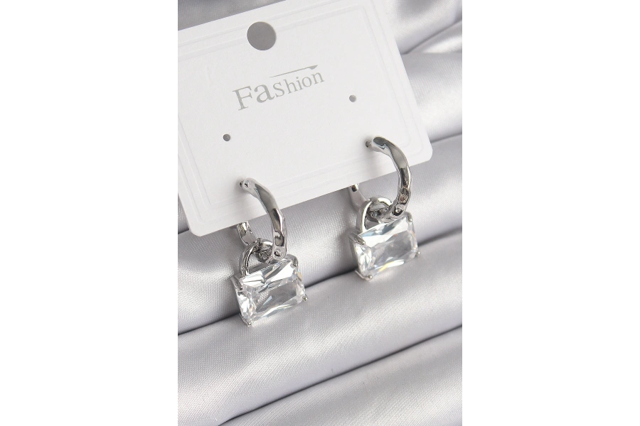 Shoecide Pirinç Gümüş Renk Sallantı Zirkon Taşlı Çanta Model Kadın Küpe