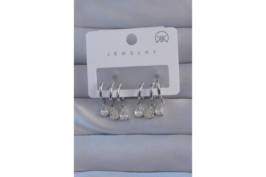 Shoecide Pirinç Gümüş Renk Zirkon Taşlı Damla Model Çoklu Görünüm Yarım Halka Küpe