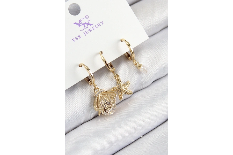 Shoecide Pirinç Zirkon Taşlı 3lü İstiridye Ve Yıldız Model Gold Renk Kadın Küpe