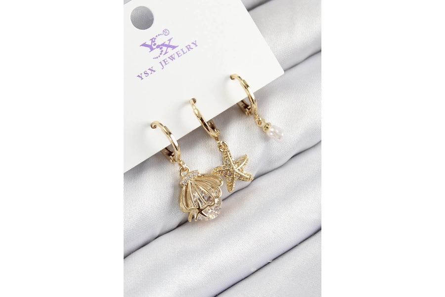 Shoecide Pirinç Zirkon Taşlı 3lü İstiridye Ve Yıldız Model Gold Renk Kadın Küpe