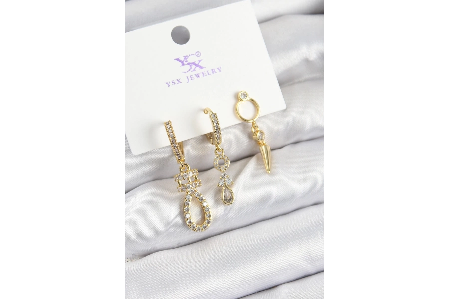 Shoecide Pirinç Zirkon Taşlı Sallantılı Model Gold Renk 3lü Kadın Küpe