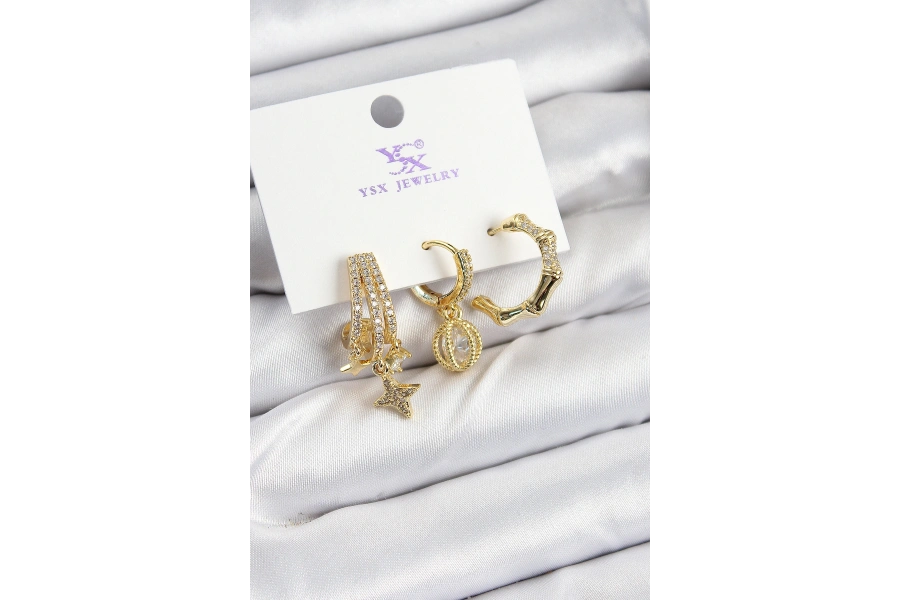 Shoecide Pirinç Zirkon Taşlı Sallantılı Yıldız Model Gold Renk 3lü Kadın Küpe