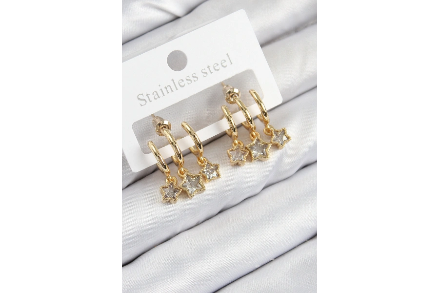 Shoecide Pirinç Zirkon Taşlı Sallantılı Yıldız Model Gold Renk Kadın Küpe