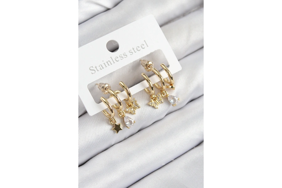Shoecide Pirinç Zirkon Taşlı Yıldız Ve Kelebek Model Gold Renk Kadın Küpe