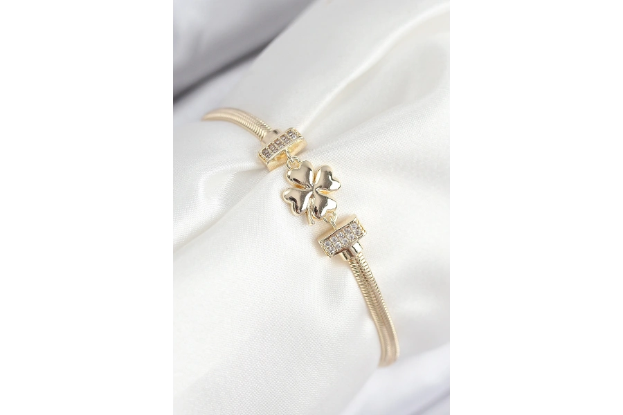 Shoecide Pirinç Zirkon Taşlı Yonca Model Gold Renk Kadın Bileklik