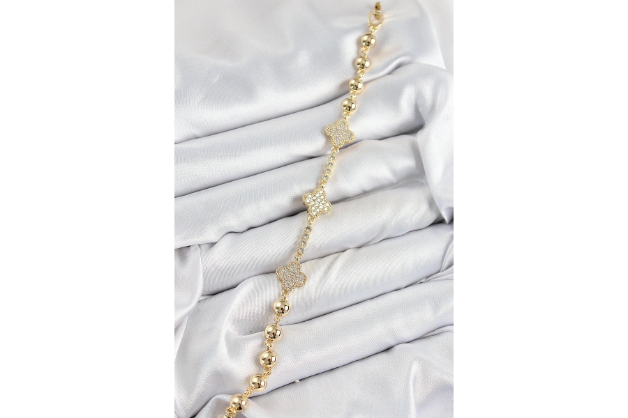 Shoecide Pirinç Zirkon Taşlı Yonca Model Gold Renk Kadın Bileklik