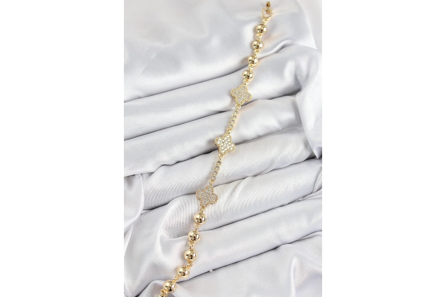 Shoecide Pirinç Zirkon Taşlı Yonca Model Gold Renk Kadın Bileklik