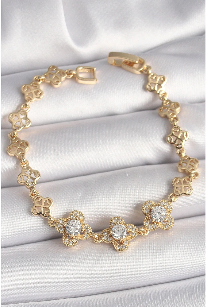 Shoecide Pirinç Gold Renk Zirkon Taşlı Yonca Model Kadın Bileklik