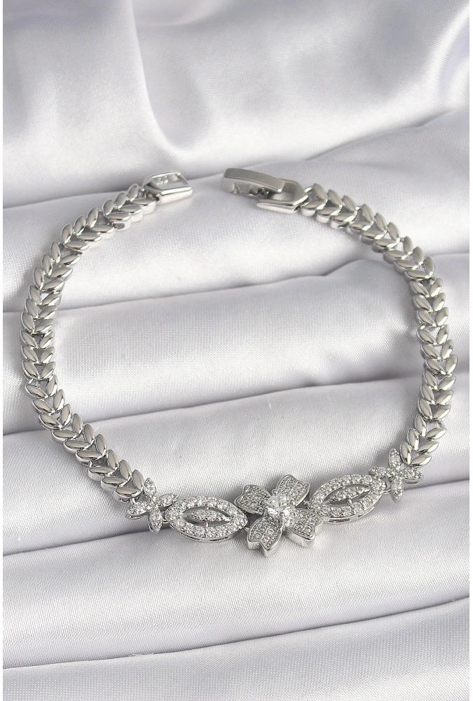Shoecide Pirinç Gümüş Renk Zirkon Taşlı Çiçek Figür Arpa Zincir Model Kadın Bileklik