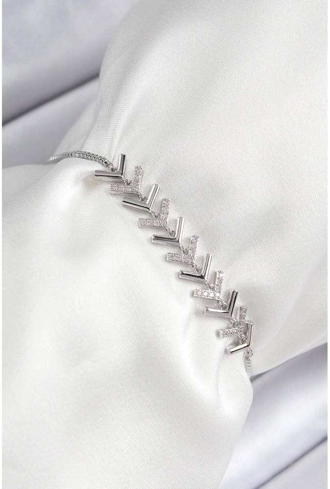 Shoecide Pirinç Zirkon Taşlı Sıralı Ok Model Gümüş Renk Asansörlü Kadın Bileklik