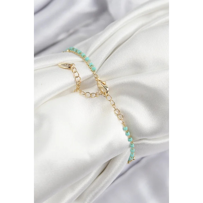 Pirinç Zirkon Taşlı Mavi Boncuklu Model Gold Renk Kadın Bileklik