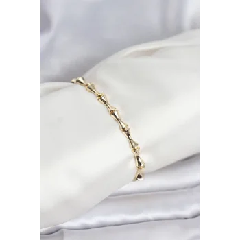 Pirinç Gold Renk VIP Seri Kemik Model Zirkon Taşlı Kadın Bileklik