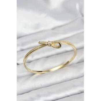 Pirinç Gold Renk Zirkon Taşlı Fiyonk Model Kadın Kelepçe Bileklik