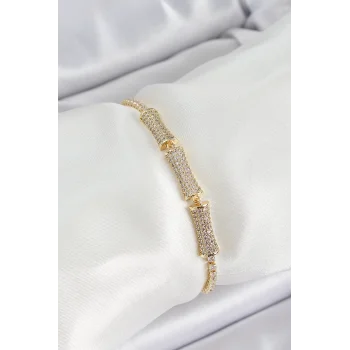 Pirinç Gold Renk Zirkon Taşlı Kemik Model Kadın Bileklik