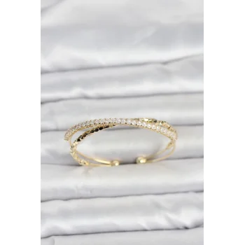 Pirinç Gold Renk Zirkon Taşlı ve Dorika Model Kadın Bileklik