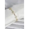 Pirinç Gold Renk Kutup Yıldızı Model Kadın Bileklik
