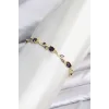 Pirinç Gold Renk Mor Zirkon Taşlı Çiçek Model Kadın Bileklik