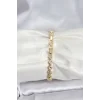 Pirinç Gold Renk VIP Seri Sıralı Yonca Model Zirkon Taşlı Kadın Bileklik
