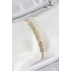 Pirinç Gold Renk Zirkon Taşlı Kemik Model Kadın Bileklik