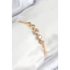 Pirinç Zirkon Taşlı Sıralı Daire Model Gold Renk Asansörlü Kadın Bileklik