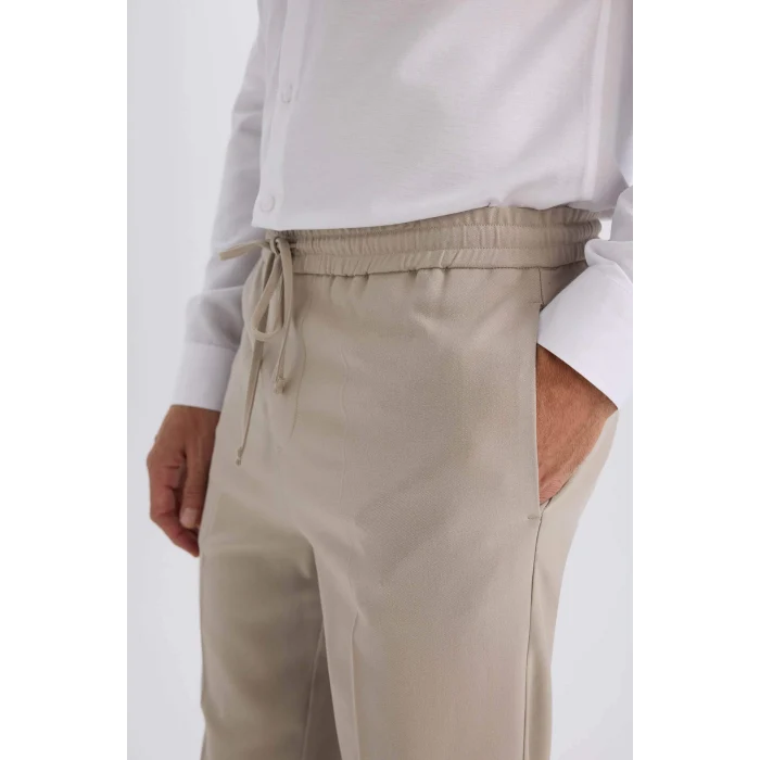 Defacto A9943 Gri Yazlık Kumaş Jogger Pantolon Beli Bağcıklı Lastikli Düz Paça Cepli Her Yöne Esneyen