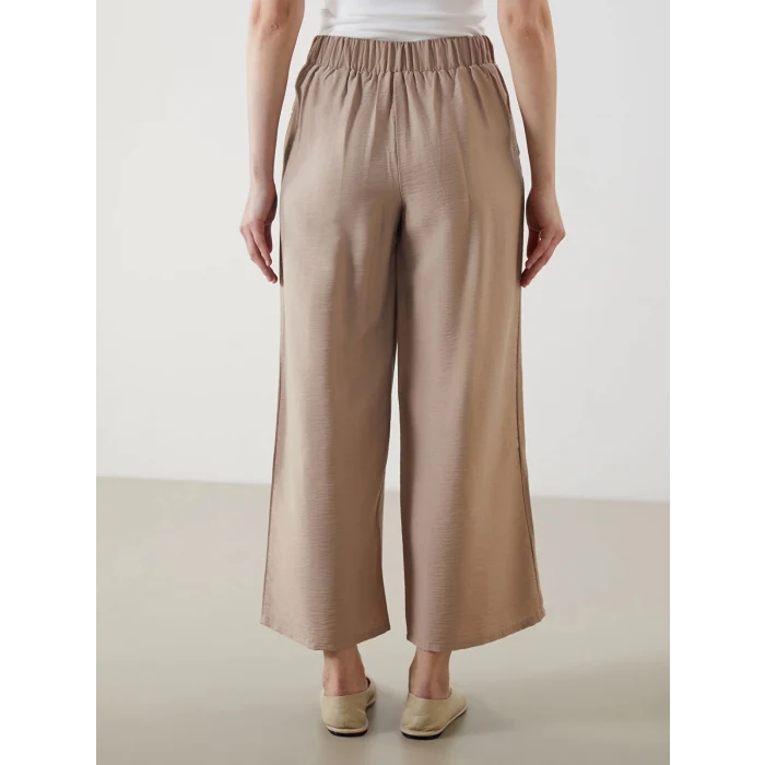 LCW Modest Bej Beli Lastikli Geniş Paça Kadın Pantolon