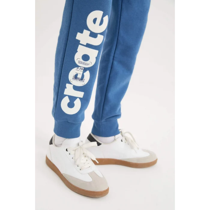 Defacto D9994 İndigo Erkek Çocuk Beli Paçası Lastikli Cepli Baskılı Eşofman Altı