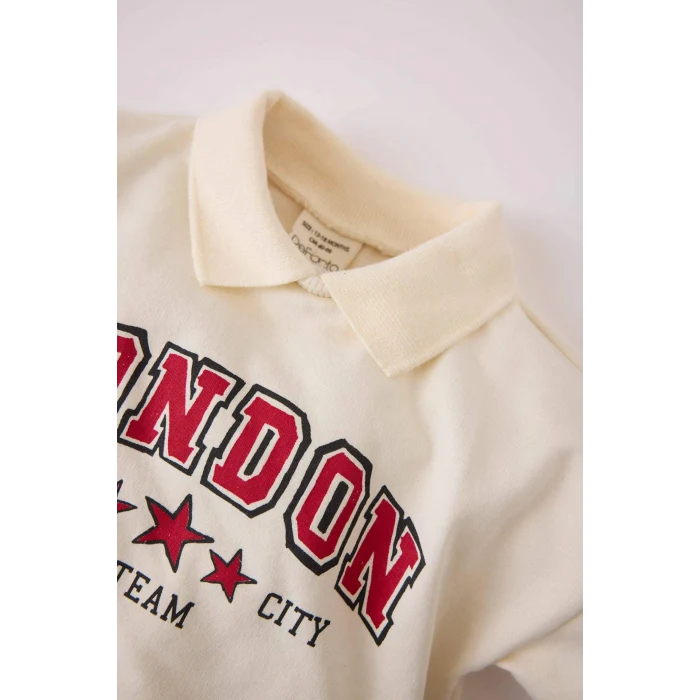 Defacto D7874 Ekru Kız Bebek 2li Takım Polo Yaka Baskılı Sweatshirt Beli Lastikli Geniş Bol Paça Eşofman Altı