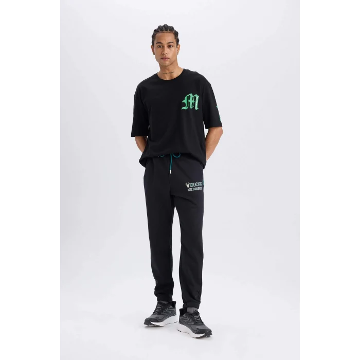 Defacto D6692 Siyah DeFactoFit NBA Milwaukee Bucks Kalın Jogger Eşofman Altı Standart Fit Cepli Beli Bağcıklı Lastikli Paça