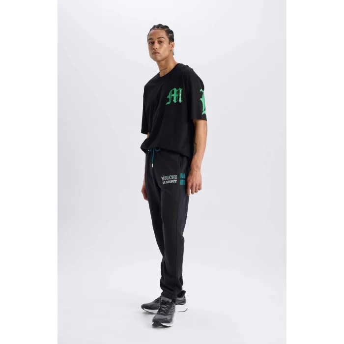 Defacto D6692 Siyah DeFactoFit NBA Milwaukee Bucks Kalın Jogger Eşofman Altı Standart Fit Cepli Beli Bağcıklı Lastikli Paça