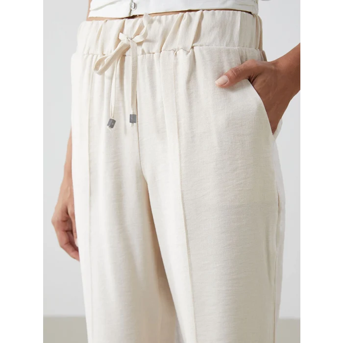LCWAIKIKI Classic Bej Beli Lastikli Kadın Pantolon