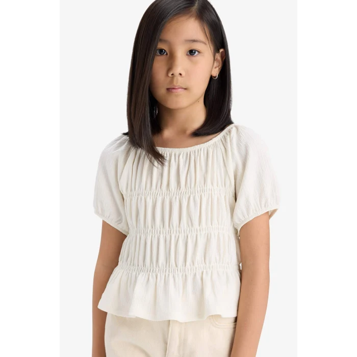 Defacto C2209 Ekru Kız Çocuk Relax Fit Bisiklet Yaka Bürümcük Kısa Kollu Bluz