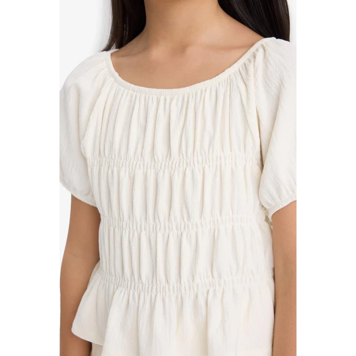 Defacto C2209 Ekru Kız Çocuk Relax Fit Bisiklet Yaka Bürümcük Kısa Kollu Bluz